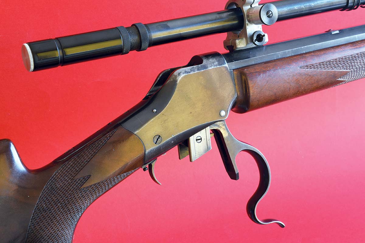 Winchester’s Model 1885 action, a John Browning design, locks with vertically sliding lugs.